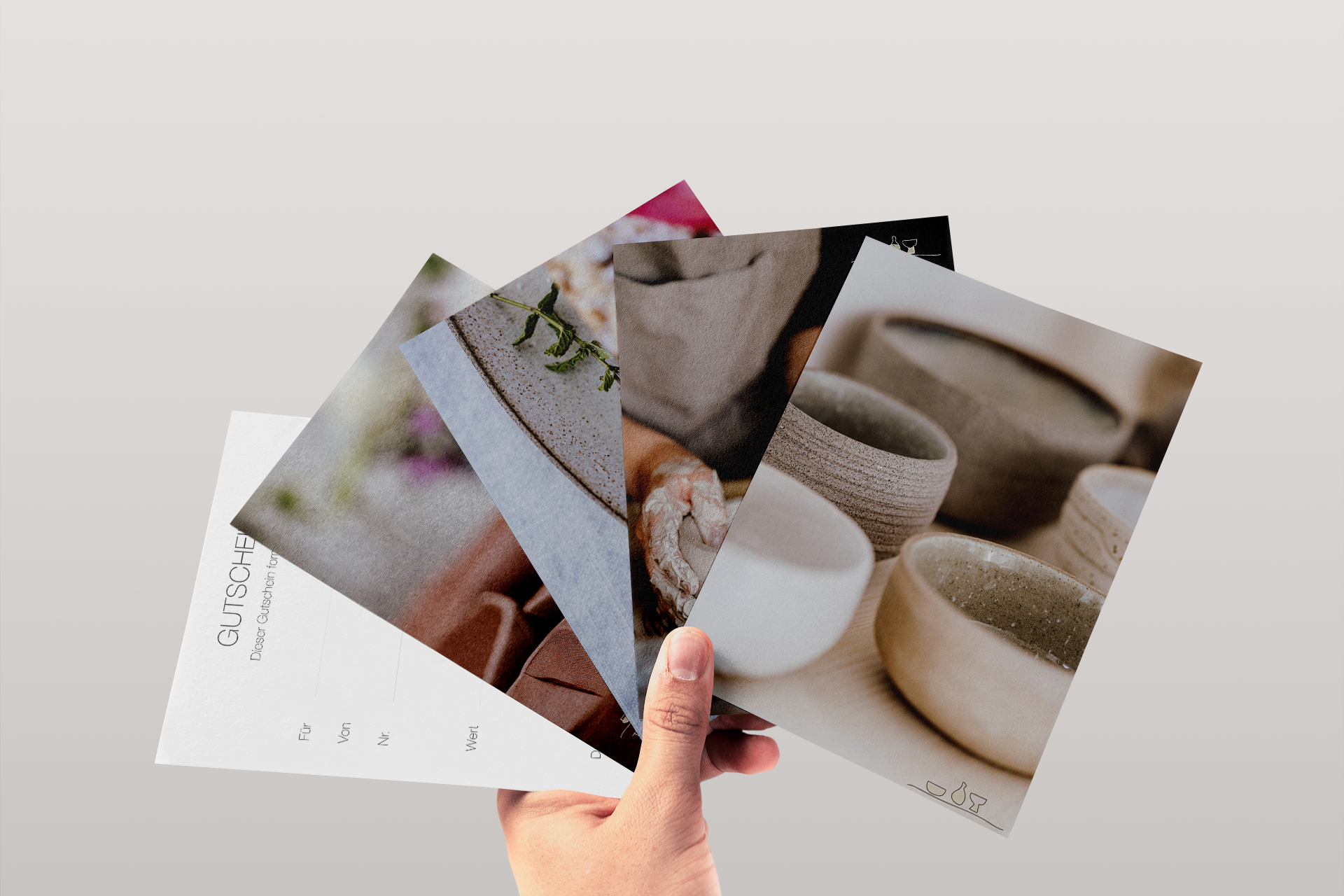 Free-Postcards-in-Hand-Mockup